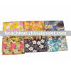 folded beach mat with flower