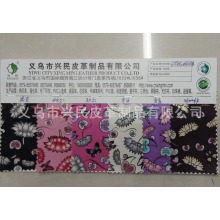 义乌市兴民皮革制品有限公司-厂家直销 人造革 PVC/PU人造革 箱包革 印花革 印荷花蝴蝶