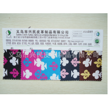 义乌市兴民皮革制品有限公司-供应PVC人造革 印花革 合成革 色丁革 色丁印古韵梅花