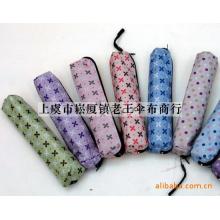 上虞市崧厦镇老王伞布商行-供应十字豆点花咖啡胶三折内翻铅笔伞